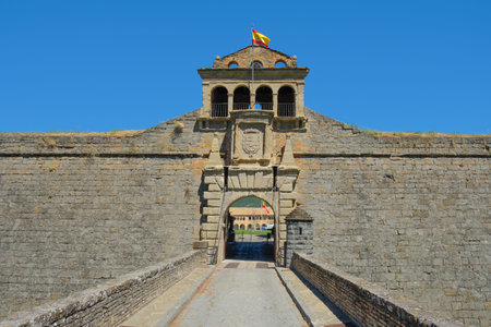 a view of the entrance to the Citadel of Jaca, in Jaca, Aragon, Spain, through the bridge over its...