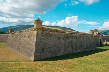 a view of the Citadel of Jaca, in Jaca, in the province of Huesca, Aragon, Spain, with the bridge over its dry moat that leads to the entrance on the rightの写真素材