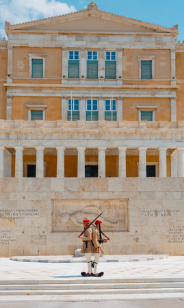 Athens, Greece - August 30, 2022: A moment of the changing of the guard at the Tomb of the Unknown Soldier in Athens, Greece, at the baottom of the Hellenic Parliamentのeditorial素材