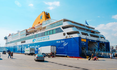 Piraeus, Greece - August 30, 2022: Passengers boarding in a big ferry in the port of Piraeus, Greece, the most important port in the countryのeditorial素材