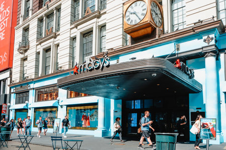 New York City, USA - May 16, 2023: People walking by the main entrance to famous Macys department store, in New York City, United States, on a sunny spring dayのeditorial素材
