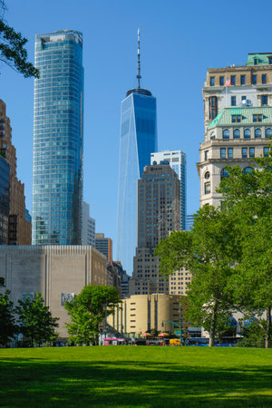 New York City, US - May 17, 2023: A view of some skyscrapers in the Financial District of New York City, such as 50 West building, left, and One World Trade Center, in the center, since Battery Parkのeditorial素材