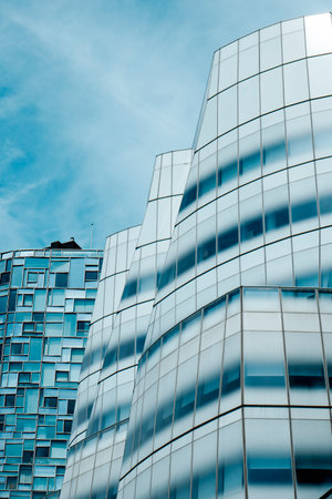 New York City, US - May 19, 2023: Detail of IAC Building in Midtown Manhatttan, New York City, United States, and and 100 11th Ave Condominium in the backgroundのeditorial素材