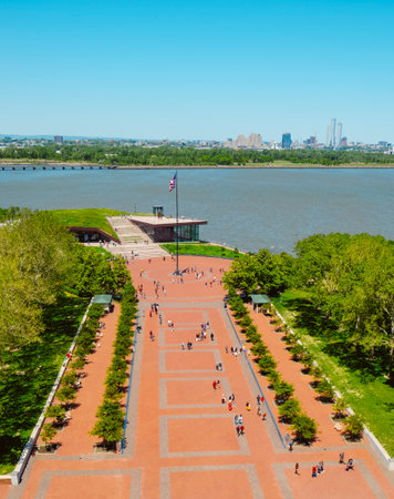 New York, US - May 17, 2023: Aerial view of Liberty Island, seen from the Statue of Liberty, towards Jersey City, in the background, highlighting the Flagpole Plaza and the Statue of Liberty Museumのeditorial素材