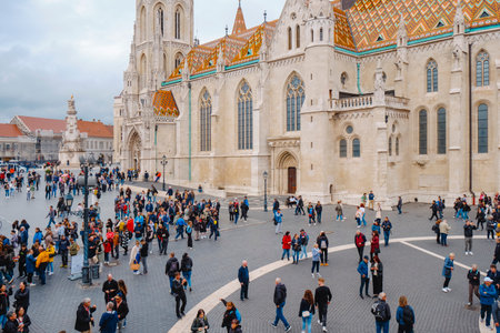Budapest, Hungary - October 5, 2024: Many tourists around the Church of the Assumption of the Buda Castle, also known as Matthias Church in Budapest, Hungaryのeditorial素材