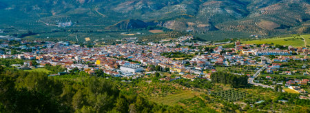 a panoramic and birds-eye view of the Andalusian town of Cuevas de San Marcos in Malaga Province,...
