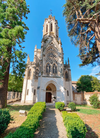 the main entrance to the Church of the Monastery of the Visitation of the Blessed Virgin Mary, in Burgos, Spain, on a summer dayの写真素材