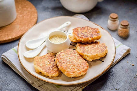 Done. Today I propose you to cook mouth-watering and delicious rice porridge pancakes. This is a great option, especially if you don't know where to put the leftover rice porridge after dinner.の写真素材