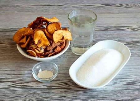 Prepare the required ingredients Apples, dried water, sugar, Yeast.の写真素材