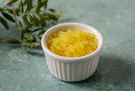 Orange caviar is ready! I am sharing a recipe for an unusual orange caviar. It tastes like marmalade. This dessert can be used as a filling for sweet tartlets or to decorate cakes and pastries with it.の写真素材