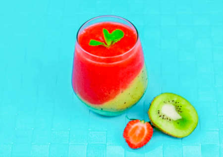 You can make such a smoothie from any fruits or berries, just freeze them and then grind them with a blender. Add honey to the smoothie as needed to sweeten the drink. Maple syrup can be substituted for honey.の写真素材