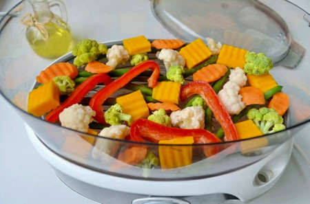 Steamed vegetables are ready! More and more people are thinking about healthy steamed food.の写真素材