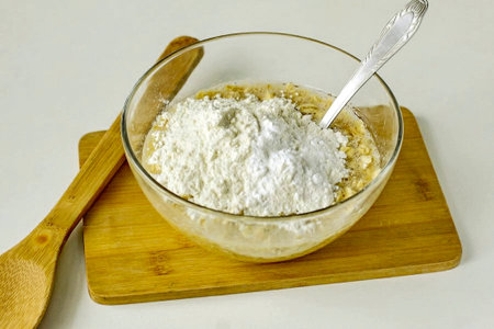 Mix everything, add flour and baking powder.の写真素材