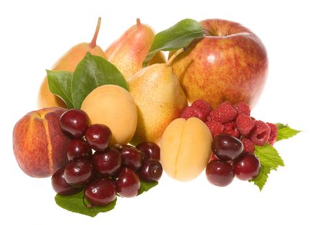 Mix of fresh fruits with leafs on white backgroundの写真素材