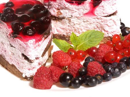 Cake with fresh berries and mintの写真素材