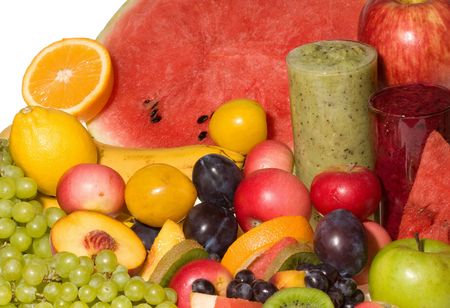 Fruits with fresh juice as backgroundの写真素材