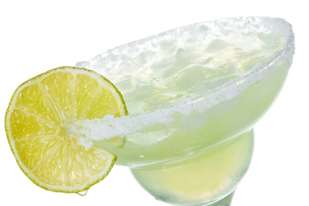 alcohol margarita cocktail with lime on white backgroundの写真素材