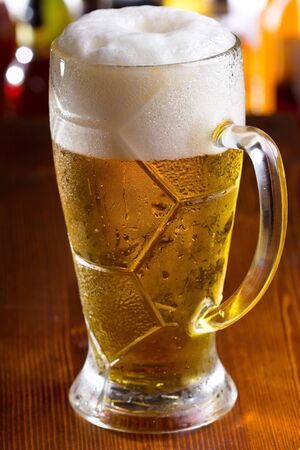 glass of beer in a barの写真素材