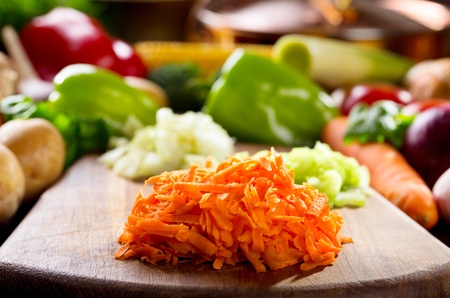 fresh chopped vegetables on a cutting  board の写真素材