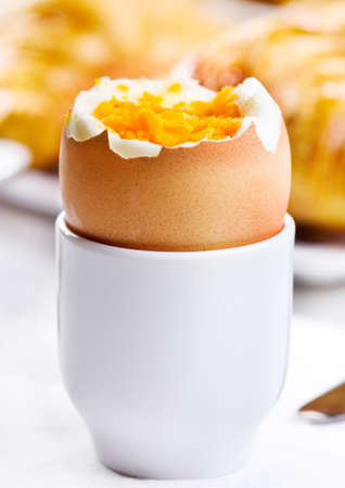 boiled egg in eggcupの写真素材