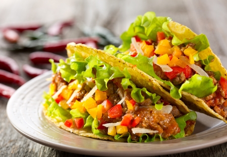 plate of taco on wooden tableの写真素材