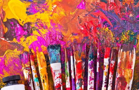 paint brushes on a paletteの写真素材