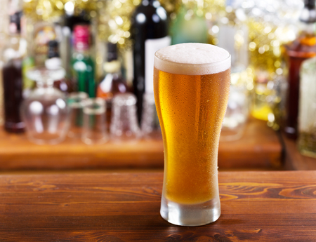 cold glass of beer in a barの写真素材