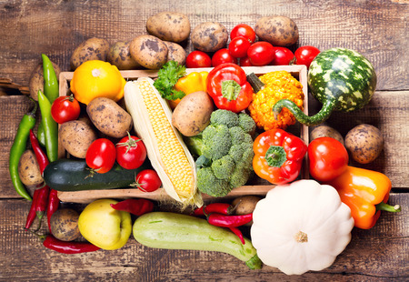 fresh vegetables on a wooden tableの写真素材