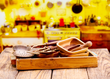 Various kitchen utensils on wooden tableの写真素材