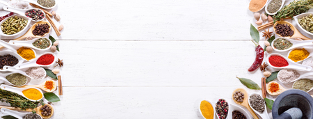 various spices on wooden background, top view with copy space, banner