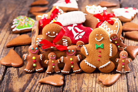 Christmas homemade gingerbread cookies on a wooden tableの写真素材