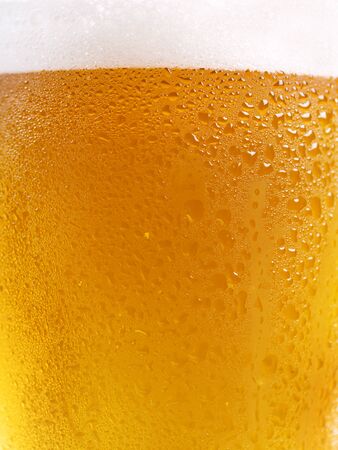 cold glass of beer as backgroundの写真素材