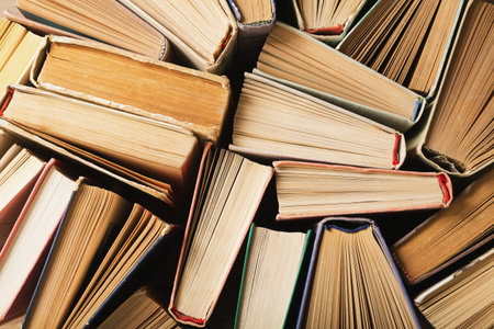 various old hardback books, top view