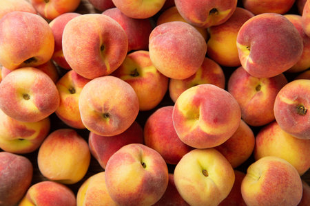 fresh ripe peaches as background, top viewの写真素材