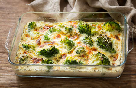 Casserole broccoli. Baked broccoli with cheese and cream sauce in baking dishの写真素材