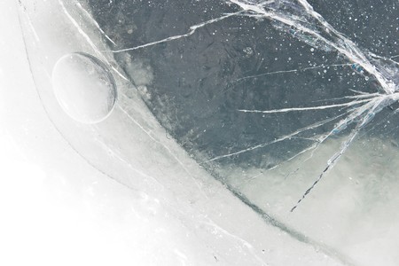 Frozen unusual universe of ovals and cracksの写真素材