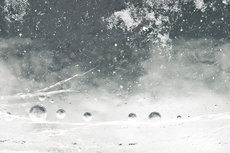 Frozen unusual universe of ovals and cracksの写真素材