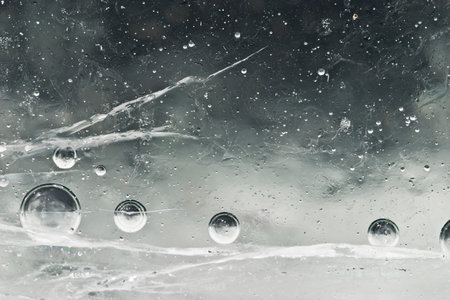 Frozen unusual universe of ovals and cracksの写真素材