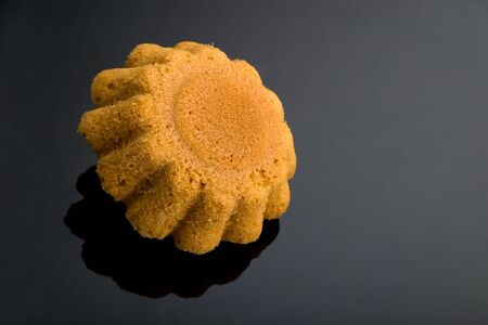 Biscuit on a black glassの写真素材