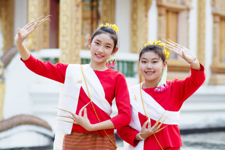Cute Thai girl in Thai northern traditional costume