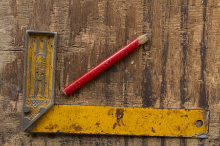 Carpenter tools on wood table backgroundの写真素材