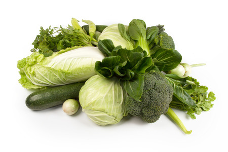 Wellness of green vegetable food for diet and healthy eating isolated white backgroundの写真素材