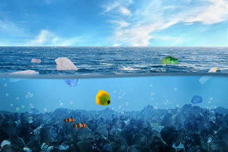 Stack of garbage bag with plastic trash under ocean with fish metaphor plastic and garbage pollution...