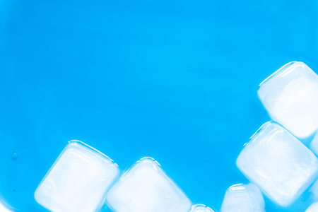 ice cube and sky blue water background