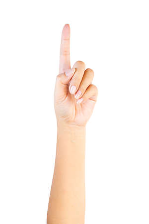 woman hand pointing something that can not be seen isolated on white backgroundの写真素材