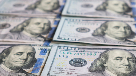 One hundred dollar bills close-up.