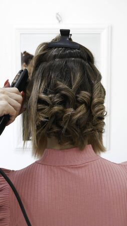 Female Hairstyles on curling in a beauty salonの写真素材