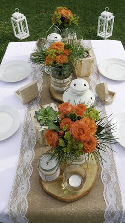 Spring table decoration for four people in natureの写真素材