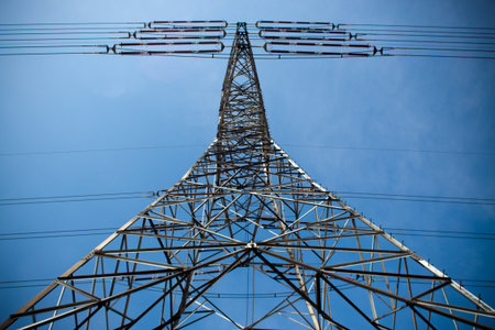 power pylons and wires during sunny day