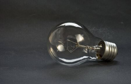 lightbulb over blackの写真素材